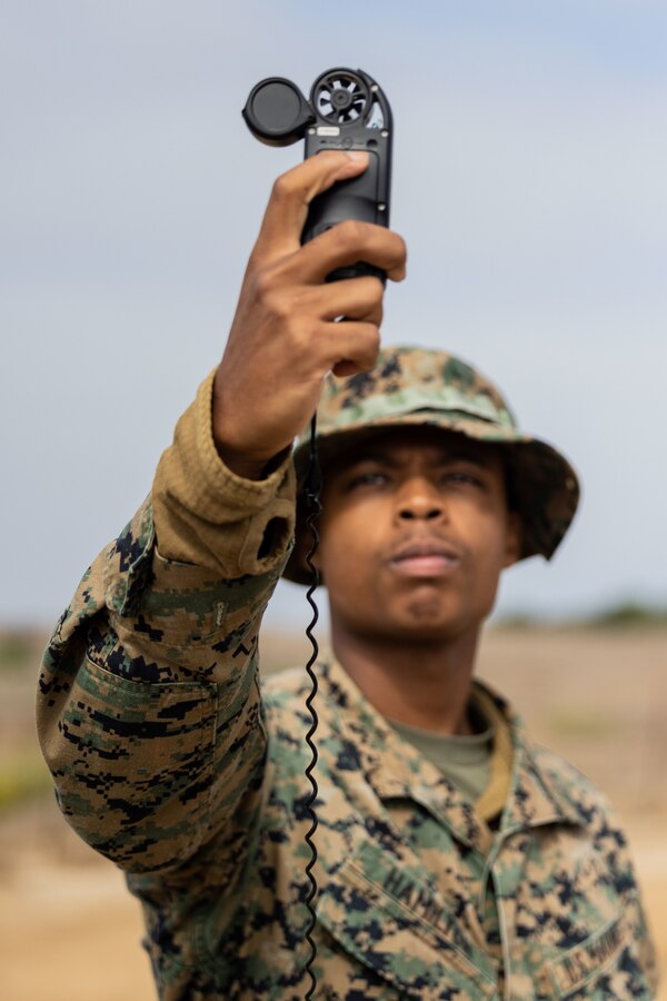 U.S. Marine Corps Cpl. Chris Hamilton, a Meteorological and Oceanographic analyst forecaster with METOC Platoon, 1st Intelligence Battalion, I Marine Expeditionary Force Information Group, takes a wind speed measurement during Cobra Horizon 24.2 at Marine Corps Base Camp Pendleton, California, Sept. 25, 2024.Cobra Horizon is a semiannual training exercise that focuses on refining expeditionary meteorology and oceanographic employment, rapid response planning processes, and integrating a multi-service METOC environment to support future missions. (U.S. Marine Corps photo by Lance Cpl. Nicole Stuart)