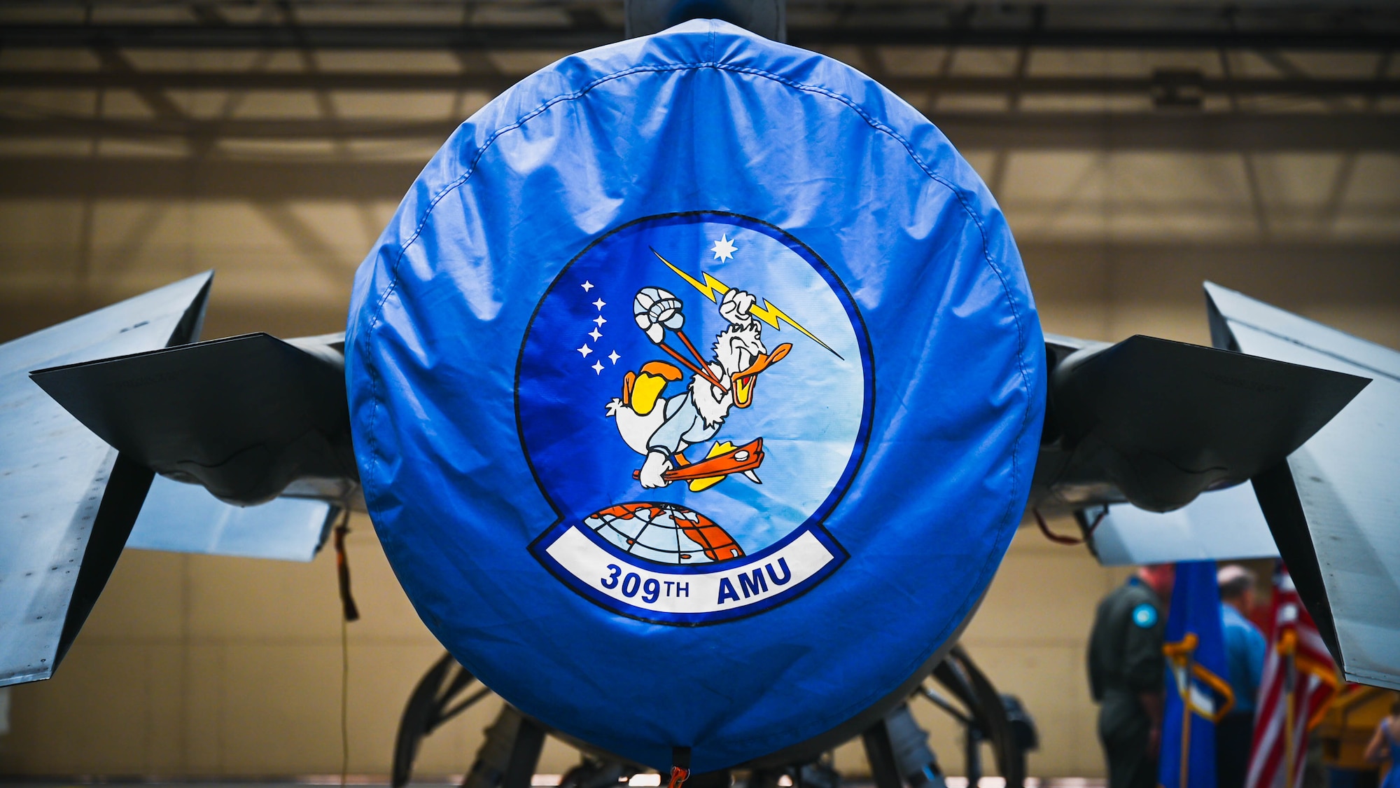 The 309th Fighter Squadron emblem is presented on the back of an F-16 Fighting Falcon, during the final 309th FS graduation for F-16 Fighting Falcon pilots.