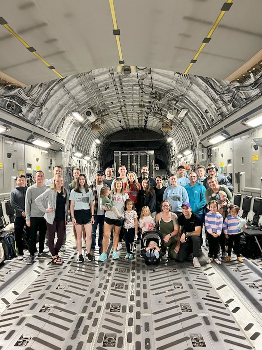 Members from Mobility’s Hometown Run Club and their families pose for a photo in a C-17 Globemaster III aircraft at Altus Air Force Base, Oklahoma, Sept. 19, 2024. The run club was created in Sept. 2023 to foster community and physical fitness. (Courtesy photo)