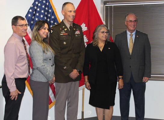 From left to right: Mike Tuttle, project manager with the Los Angeles District’s Section 595 Program; Danya Acosta City of Douglas council member; Col. Andrew Baker, LA District commander; Ana Urquijo, City manager of Douglas; and Donald Huish, mayor of the City of Douglas, pose for a picture after signing two separate project partnership agreements for projects in both cities under the Section 595 Program Sept. 16 in Phoenix. The primary objective of the 595 Program is to provide design and construction assistance to non-federal-sponsor interests for carrying out water-related environmental infrastructure and resource protection and development projects in Arizona and rural Nevada.