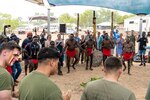 U.S. Marines, families of the fallen, and members of the Australian Defence Force participate in a Pukumani ceremony hosted by the Tiwi Island-Mantiyupwi clan, in collaboration with the Larrakia Nation Aboriginal Corporation, at Melville Island, Tiwi Islands, Australia, Sept. 27, 2024. The Pukumani Ceremony is a traditional Tiwi people ritual that honors the deceased and helps guide their spirits to the afterlife, marking the official end of mourning. For the first time, U.S. Marines and family members of the fallen were honored by the Tiwi and Larrakia people during the week leading up to two culturally significant ceremonies: a healing ceremony and a Pukumani ceremony. These ceremonies commemorated the three U.S. Marines who tragically lost their lives in a U.S. Marine Corps MV-22B Osprey crash on Melville Island on Aug. 27, 2023. (U.S. Marine Corps photo by Gunnery Sgt. Kassie McDole)