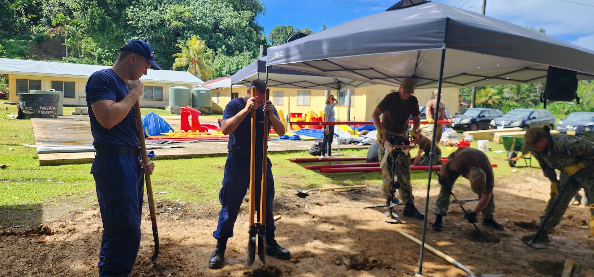 U.S. Coast Guard Forces Micronesia/Sector Guam personnel contribute to a community service project for the playground at Lelu school as part of Pacific Partnership 2024, in Kosrae, further strengthening maritime safety awareness and building meaningful relationships within the local community on Sept. 2024. During the mission stop, U.S. Coast Guard personnel led four comprehensive boating safety workshops at the Kosrae Community Center and the island’s three marinas — Okat, Lelu, and Utwe. These workshops provided crucial information on maritime safety and search and rescue operations, with a particular focus on addressing the unique challenges faced by remote island communities like Kosrae. (U.S. Coast Guard photo by Lt. j.g. Melissa Reilly)