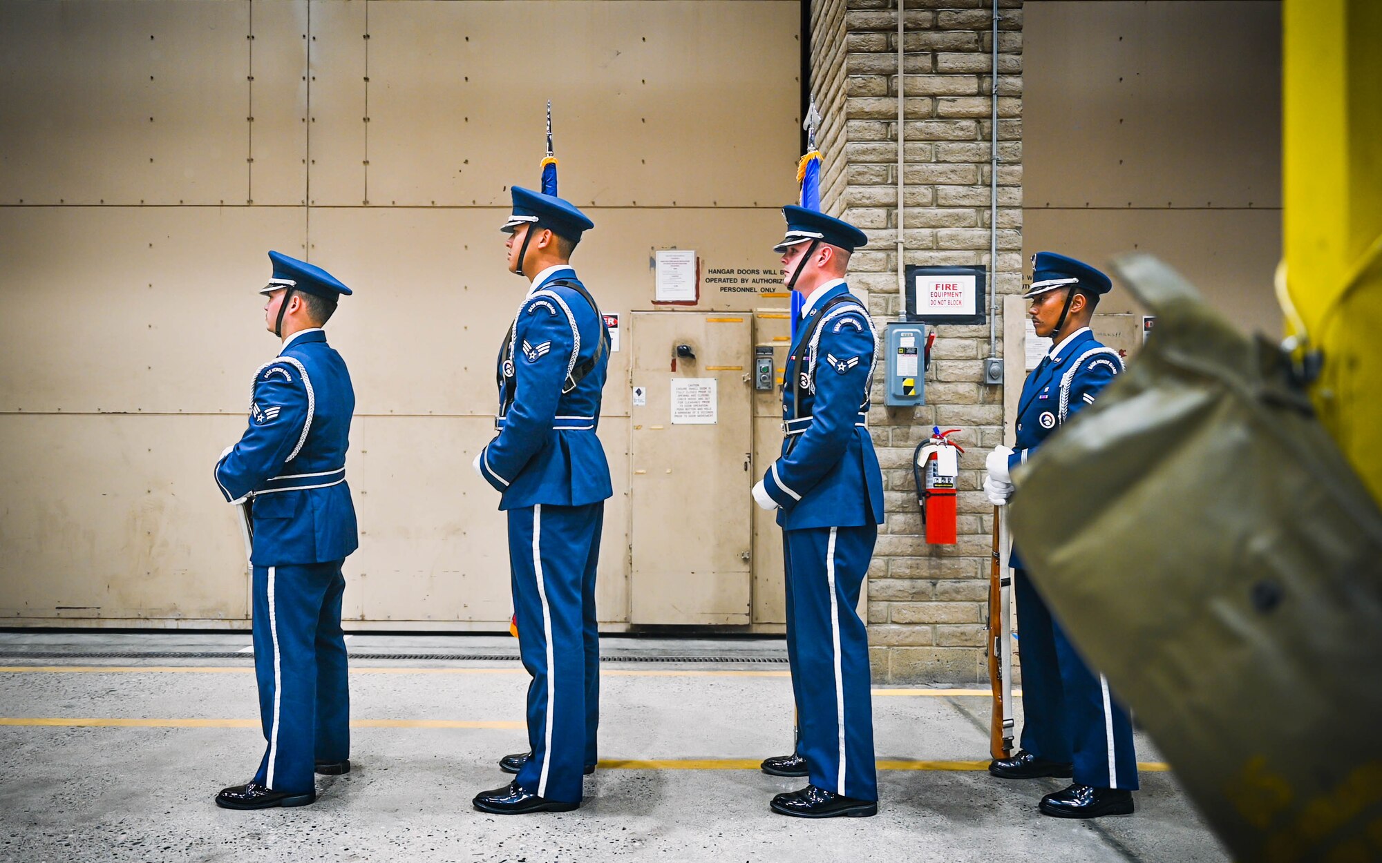 Luke Air Force Base Honor Guard members wait to present the colors during the final 309th Fighter Squadron graduation for F-16 Fighting Falcon pilots.