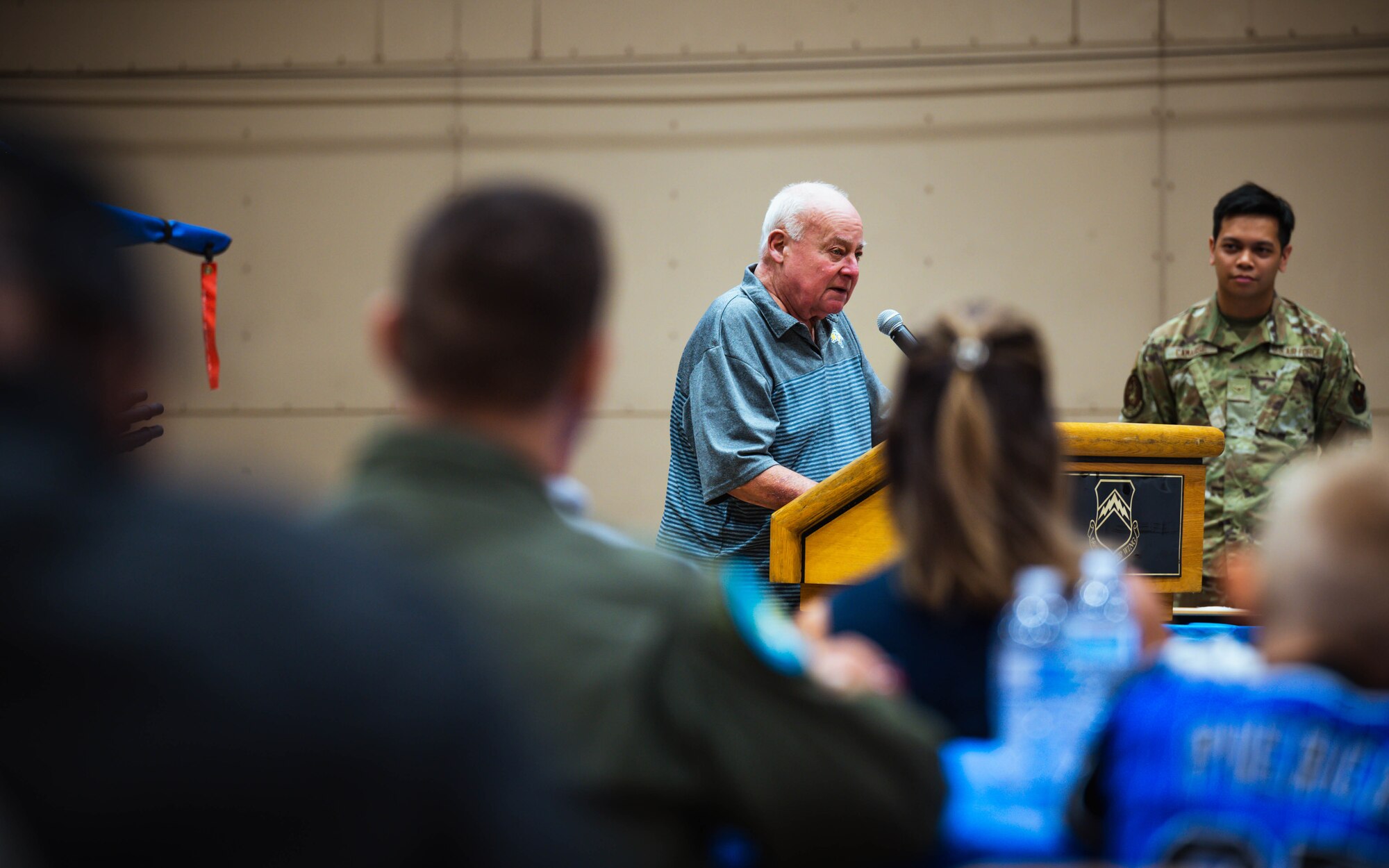 James Uken, retired U.S. Air Force colonel, speaks at the final 309th Fighter Squadron graduation for F-16 Fighting Falcon pilots.