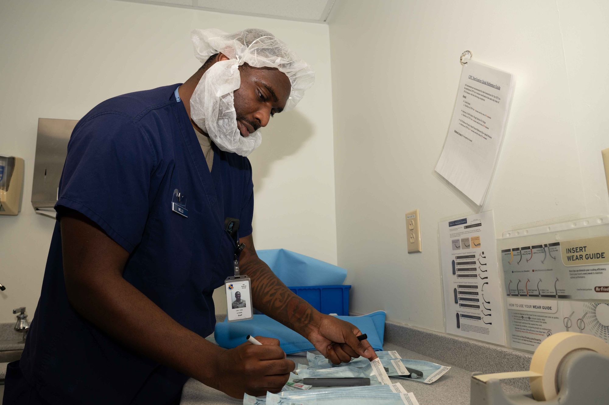 U.S. Air Force Airman 1st Class Julian Wells, 4th Operational Medical Readiness Squadron infection control monitor, packages dental instruments at the Kiecker Dental Clinic located on Seymour Johnson Air Force Base, North Carolina, July 26, 2024. Wells makes sure all dental instruments are sterilized daily and ready for the next treatment, ensuring service members assigned to the 4th Fighter Wing can continue supporting the mission knowing their dental needs are met. (U.S. Air Force photo by Airman 1st Class Rebecca Tierney)