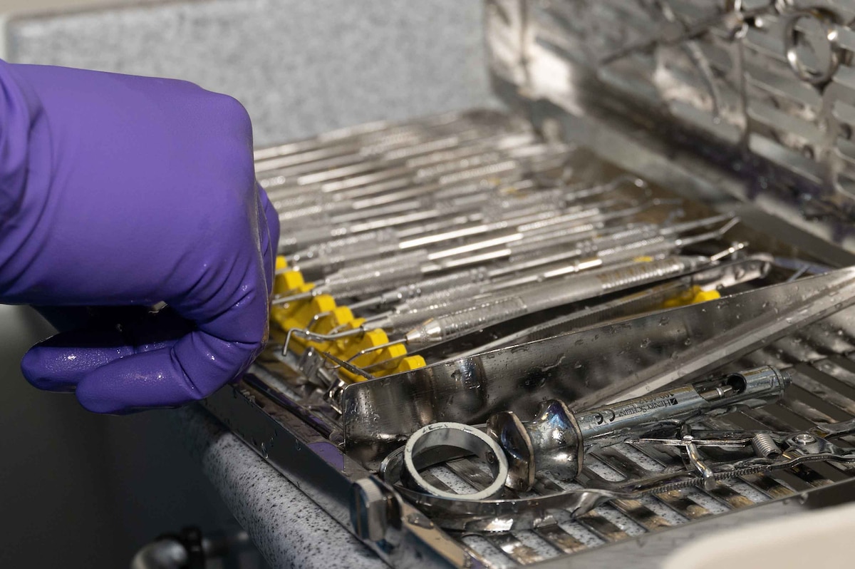 U.S. Air Force Airman 1st Class Julian Wells, 4th Operational Medical Readiness Squadron infection control monitor, arranges dental instruments in a cassette at the Kiecker Dental Clinic located on Seymour Johnson Air Force Base, North Carolina, July 26, 2024. Wells makes sure all dental instruments are sterilized daily and ready for the next treatment, ensuring service members assigned to the 4th Fighter Wing can continue supporting the mission knowing their dental needs are met. (U.S. Air Force photo by Airman 1st Class Rebecca Tierney)