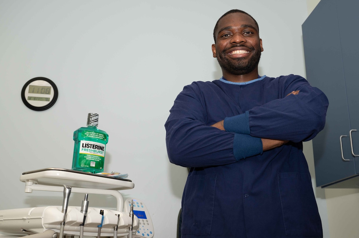U.S. Air Force Airman 1st Class Julian Wells, 4th Operational Medical Readiness Squadron infection control monitor, poses for a photo at the Kiecker Dental Clinic located on Seymour Johnson Air Force Base, North Carolina., July 26, 2024. Wells makes sure all dental instruments are sterilized daily and ready for the next treatment, ensuring service members assigned to the 4th Fighter Wing can continue supporting the mission knowing their dental needs are met. (U.S. Air Force photo by Airman 1st Class Rebecca Tierney)