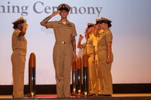U.S. Navy Chief Petty Officer Jennifer McKenna, a newly appointed Chief Petty Officer with 2d Battalion, 2d Marine Regiment, 2d Marine Division, and a Clio, Michigan native, renders a salute during a Chief Petty Officer pinning ceremony on Marine Corps Base Camp Lejeune, North Carolina, Sept. 27, 2024. Established by the Navy in 1893, the distinction for Chief Petty Officer was marked by changes in uniform and authority, with Chief Selects completing a six-week initiation that included physical fitness, team-building, and leadership training. (U.S. Marine Corps photo by Cpl. Alexis Sanchez)