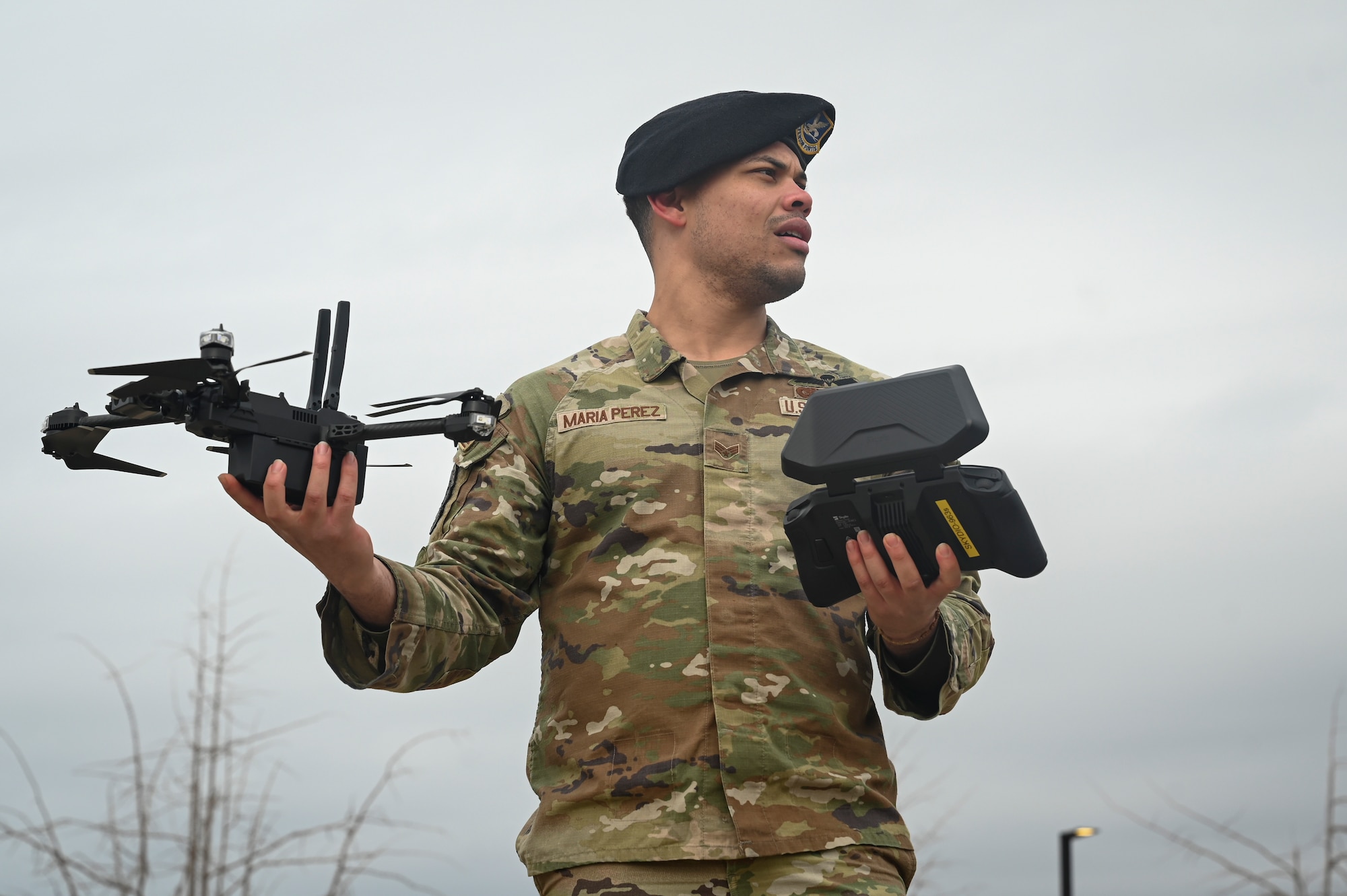 Senior Airman Richard Maria Perez, 8th Security Forces Squadron small unmanned aircraft system NCO in charge, prepares to fly a sUAS.
