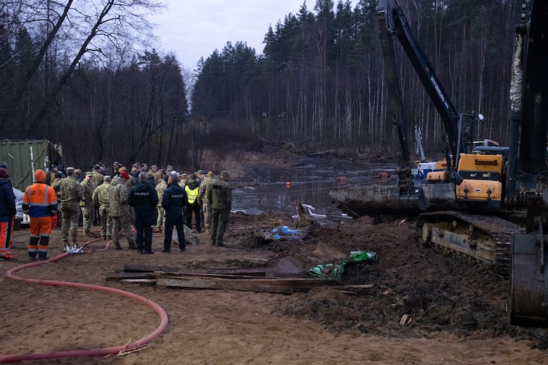 Military Police of the Estonian Defense Force use search and rescue dogs to assist in recovery efforts of missing U.S. soldier on a military training site