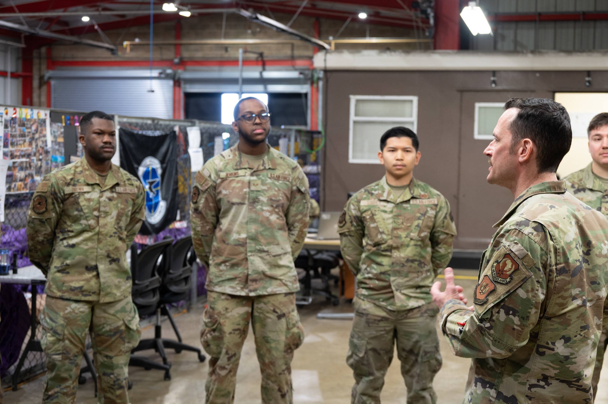 U.S. Air Force Maj. Gen. Paul Moga, Third Air Force commander, speaks with Pathfinders