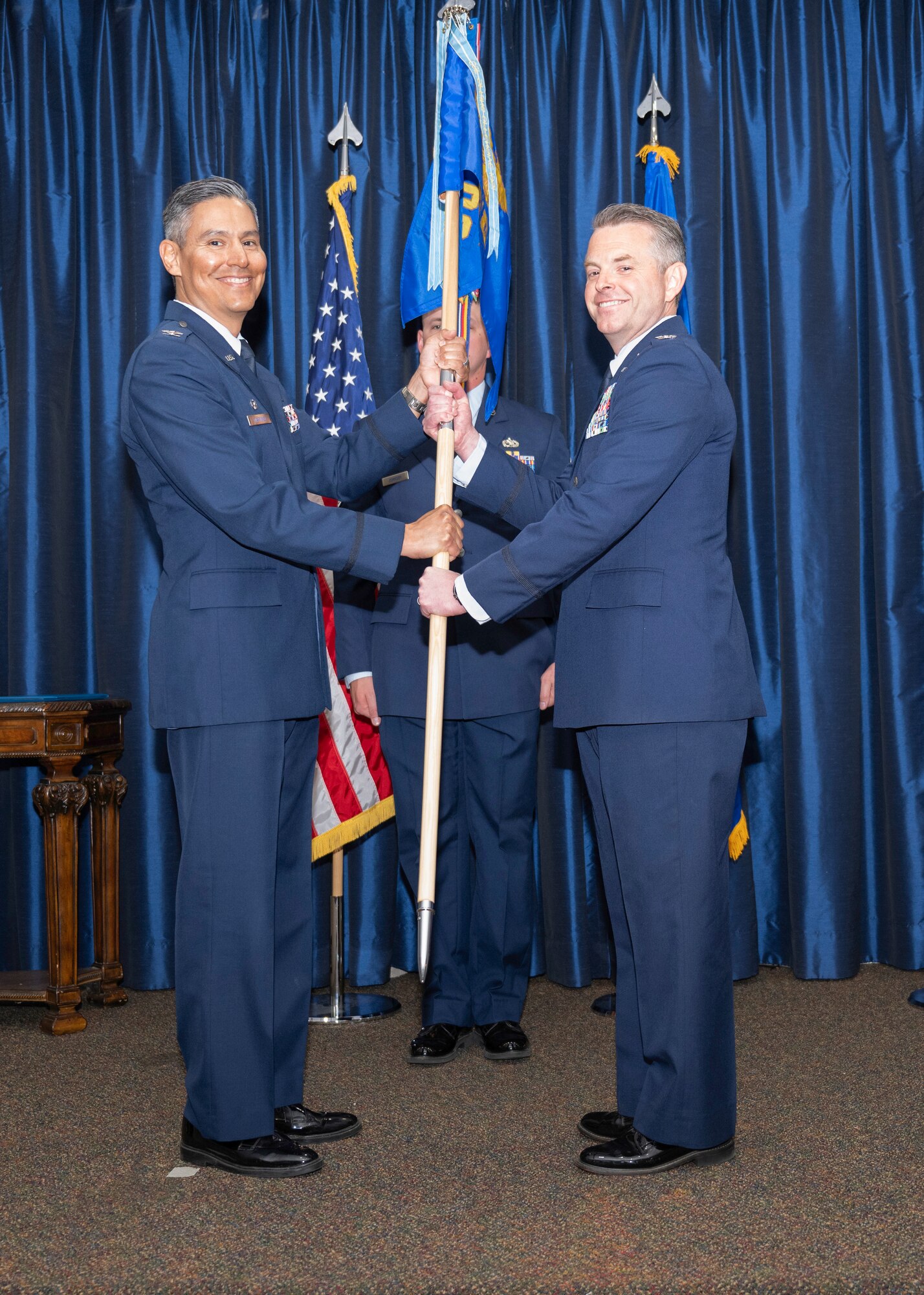 U.S. Air Force Col. Aaron Bohl, 307th Operations Group Commander, accepts the unit’s guidon from Col. David Martinez, 307th Bomb Wing Commander, at Barksdale Air Force Base, Louisiana, March 28, 2025. Col. Bohl has held multiple positions within the 307th BW since transitioning from the U.S. Marine Corps to the Air Force Reserve in 2012. (U.S. Air Force photo by Senior Master Sgt. Ted Daigle)