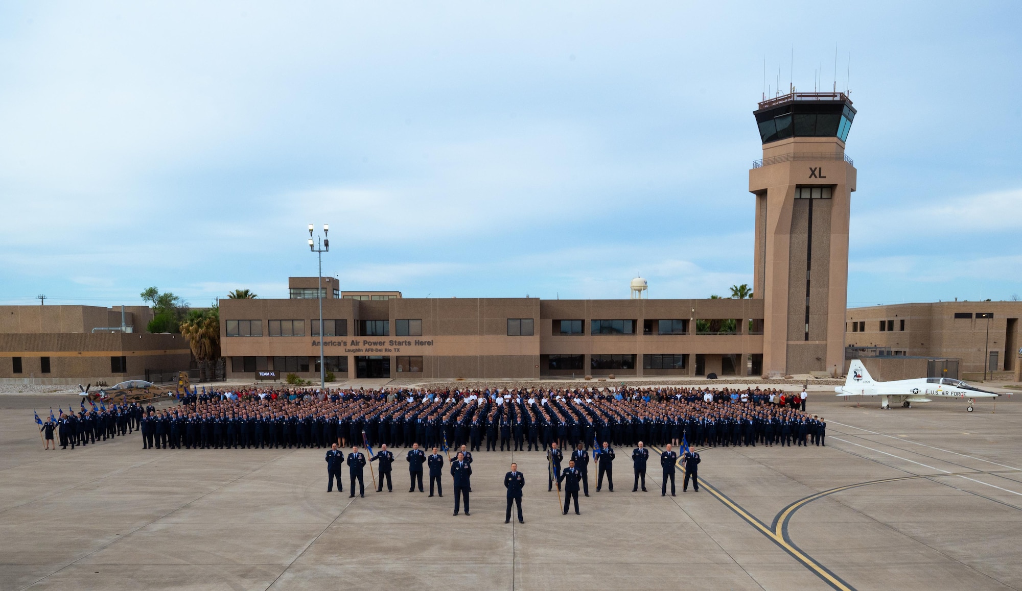 The 47th Flying Training Wing poses for their wing photo at Laughlin Air Force Base on March 28, 2025. 1,200 total force Airmen lined up on the flightline for their wing photo. (U.S. Air Force photo by Airman 1st Class Harrison Sullivan)