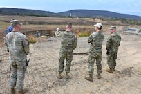 Col. Kevin Potts, Fort Indiantown Gap garrison commander, points out a feature at a combined-arms live-fire, or CALFEX, range that is under construction March 28, 2025, at Fort Indiantown Gap, Pa. (Pennsylvania National Guard photo by Brad Rhen)