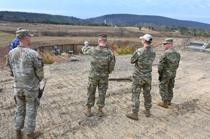 Col. Kevin Potts, Fort Indiantown Gap garrison commander, points out a feature at a combined-arms live-fire, or CALFEX, range that is under construction March 28, 2025, at Fort Indiantown Gap, Pa. (Pennsylvania National Guard photo by Brad Rhen)