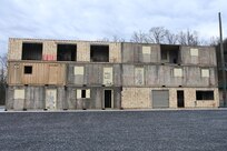A new sniper tower is being added to a sniper range at Fort Indiantown Gap, Pa. The tower, which is built out of shipping containers that have been welded together and shaped into rooms with different dimensions and configurations is 3 stories high and approximately 100 feet wide. (Pennsylvania National Guard photo by Brad Rhen)