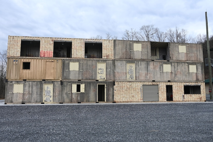 A new sniper tower is being added to a sniper range at Fort Indiantown Gap, Pa. The tower, which is built out of shipping containers that have been welded together and shaped into rooms with different dimensions and configurations is 3 stories high and approximately 100 feet wide. (Pennsylvania National Guard photo by Brad Rhen)