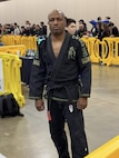 Maj. Chris Wright, an operations officer with U.S. Army Medical Logistics Command, is pictured between matches at his first ever International Brazilian Jiu-Jitsu Federation event in Fredericksburg, Va. Wright, who was promoted to black belt in December 2024, finished in third place in his division at the event.