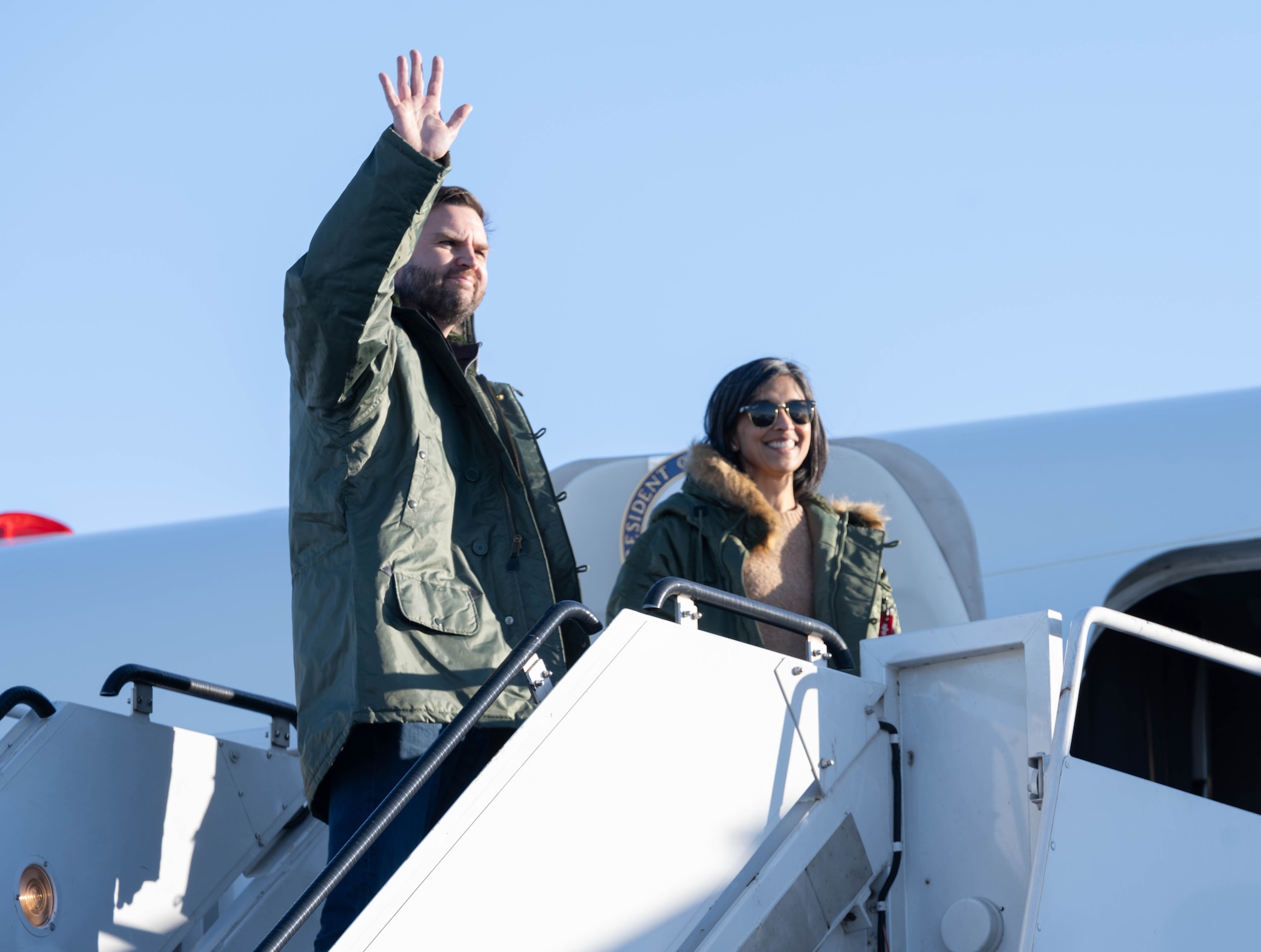 ice President JD Vance boards Air Force 2 with Second Lady Usha Vance at Pituffik Space Base, Greenland, March 28, 2025.