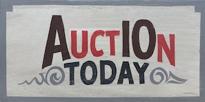 A sign with a wooden appearance that says "Auction Today." The A, I, and O in Auction are larger and a different color to imply they say "A-10."