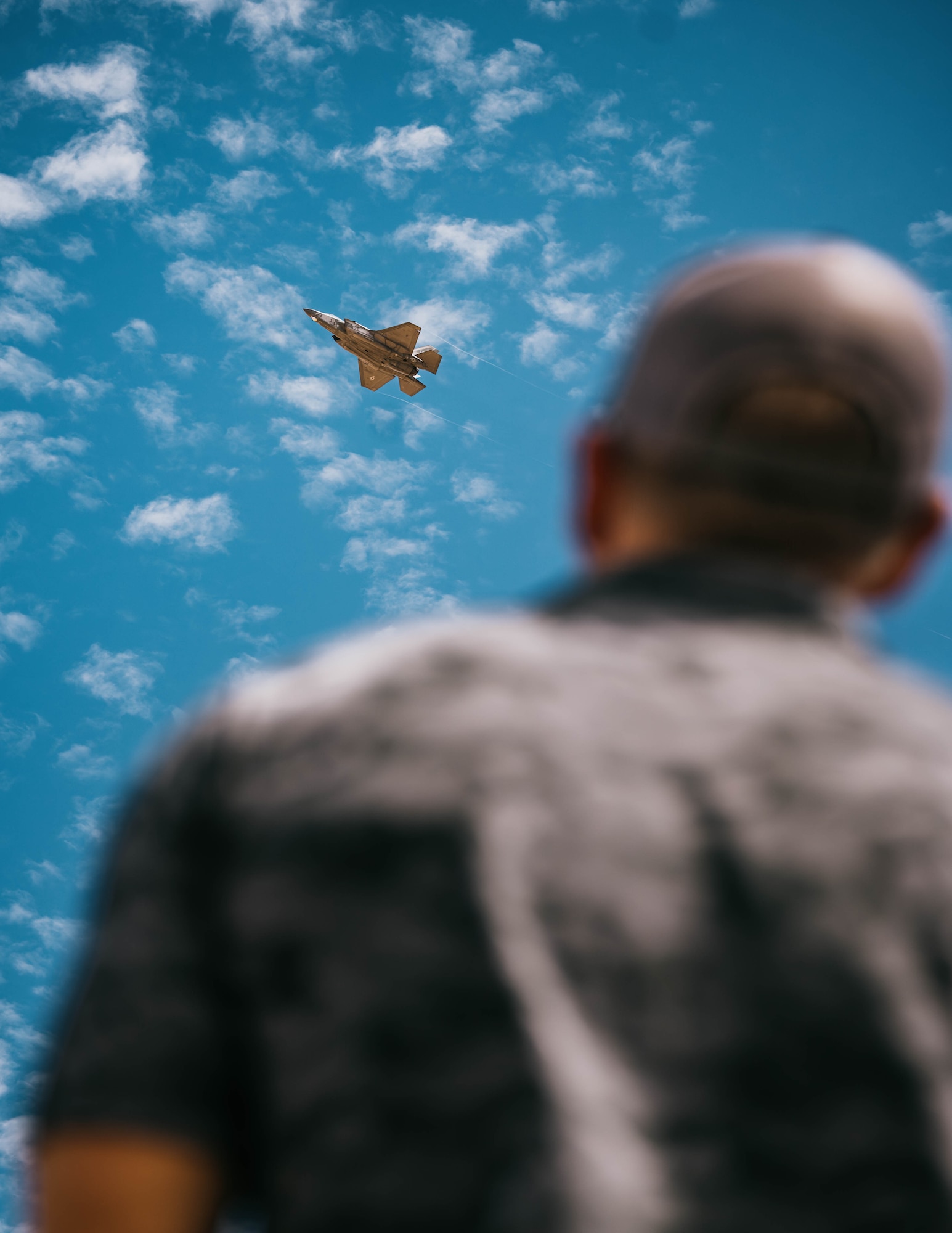 A U.S. Air Force F-35A Lightning II assigned to the 56th Fighter Wing, performs a strafing run for community leaders.