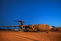 A photo of a jet on a flightline ramp.