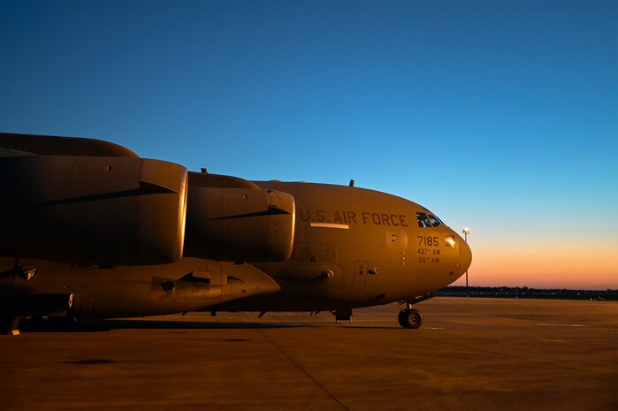 A photo of a jet on a flightline ramp.