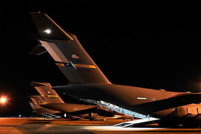 A photo of several jets on a flightline ramp.