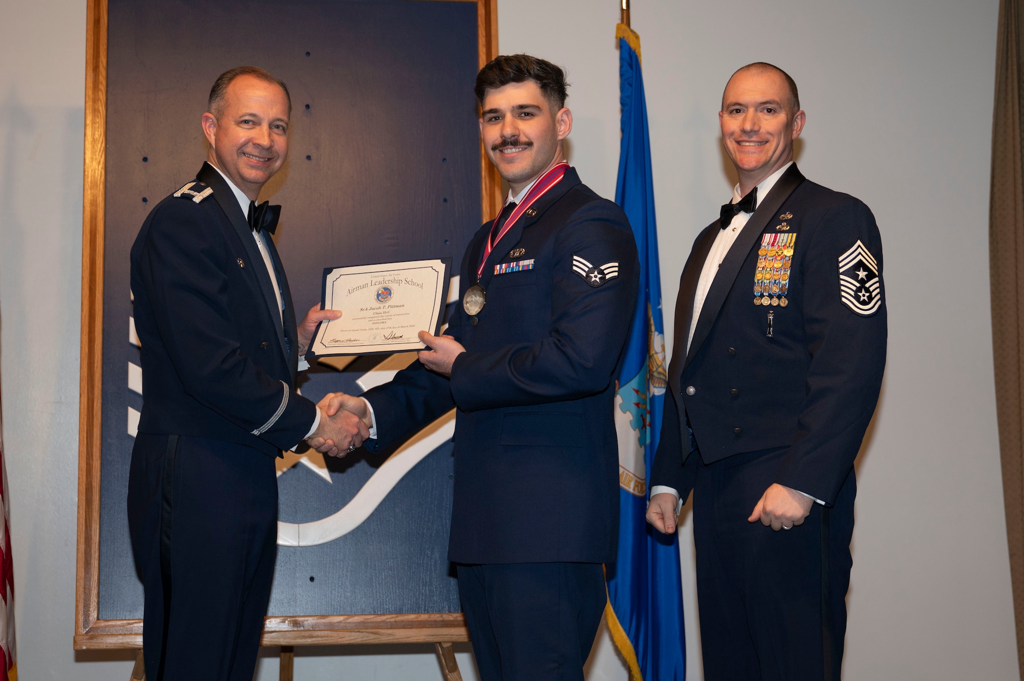 ALS class 25-C students celebrate graduation at Grand Forks AFB