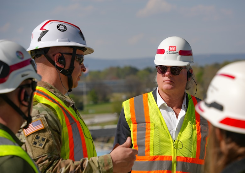 Lt. Col. Robert Green, U.S. Army Corps of Engineers Nashville District commander, speaks to Rep. Mike Collins, Georgia 10th District, chairman of the House Subcommittee on Water Resources and Environment, at the Chickamauga Lock Replacement Project in Chattanooga, Tennessee, March 28, 2025. Collins visited the project as part of a tour of southeastern infrastructure sites that also included Wilson Lock on the Tennessee River, also managed by the USACE Nashville District. (USACE Photo by Jeremy Croft)