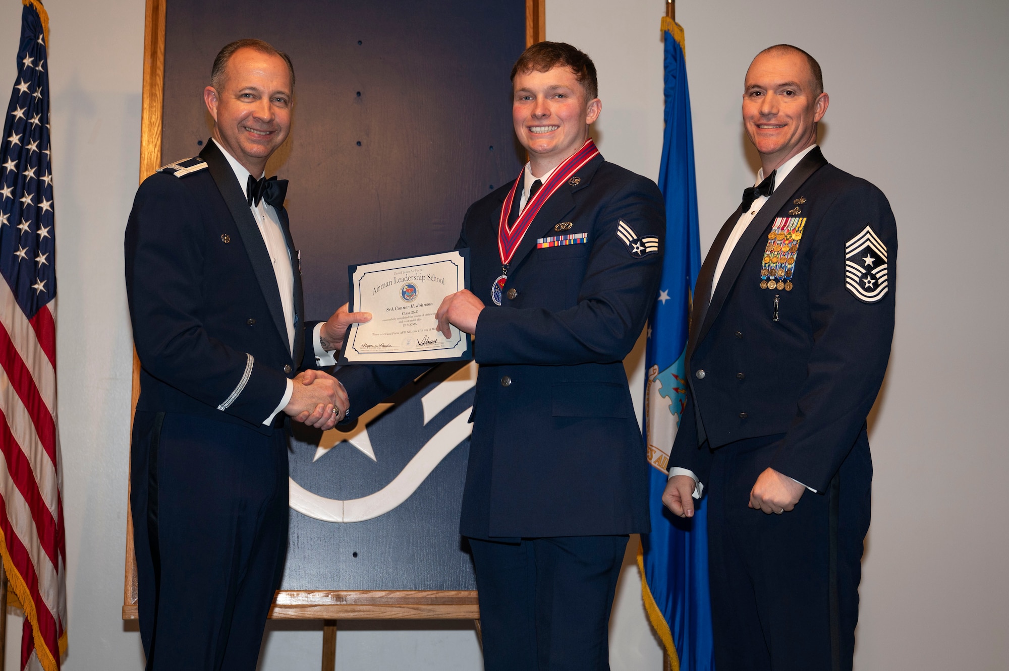 ALS class 25-C students celebrate graduation at Grand Forks AFB