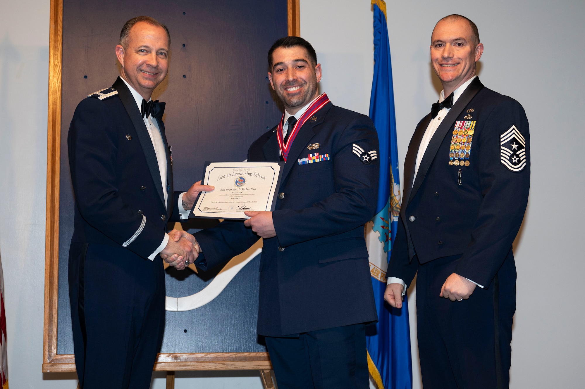 ALS class 25-C students celebrate graduation at Grand Forks AFB
