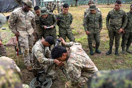 Soldiers with the Philippine Army 5th and 7th Infantry Division and U.S. Army Soldiers of the Cross-Domain Effects Company, 1st Battalion, 21st Infantry Regiment (Task Force Gimlet), 25th Infantry Division, participated in a subject matter expert exchange on mortar operations training using the M252 18mm, M120, and 60mm mortar firing systems during Salaknib 25 at Fort Magsaysay, Philippines, March 27, 2025.