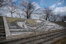 A mosaic of a salmon overlooks the Oirase Shimoda Salmon Park at Oirase, Japan, March 15, 2025.
