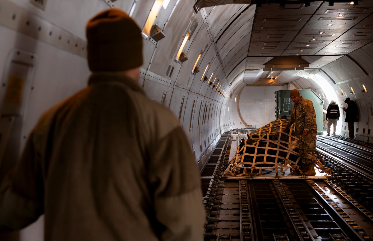 U.S. Air Force Airman 1st Class Daniel Archer, 35th Maintenance Squadron conventional munitions crew chief, moves cargo in preparation of Balikatan 25 at Misawa Air Base, Japan, April 1, 2025. The 35th Logistics Readiness Squadron provides critical logistical support, keeping the 35th Fighter Wing postured for agile operations in the Indo-Pacific theater. (U.S. Air Force photo by Senior Airman Brittany Russell)