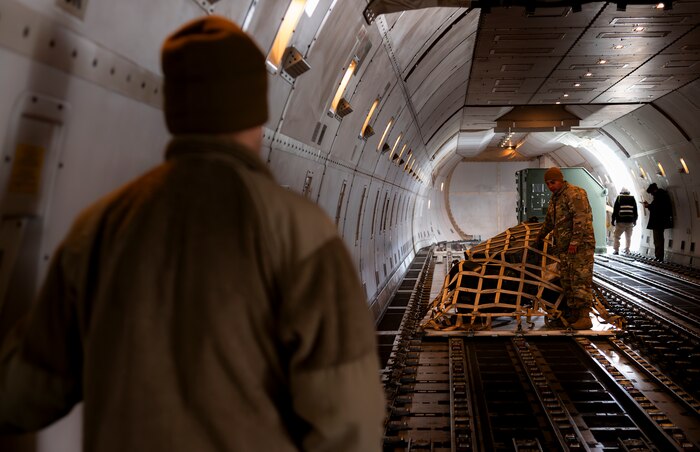 U.S. Air Force Airman 1st Class Daniel Archer, 35th Maintenance Squadron conventional munitions crew chief, moves cargo in preparation of Balikatan 25 at Misawa Air Base, Japan, April 1, 2025. The 35th Logistics Readiness Squadron provides critical logistical support, keeping the 35th Fighter Wing postured for agile operations in the Indo-Pacific theater. (U.S. Air Force photo by Senior Airman Brittany Russell)