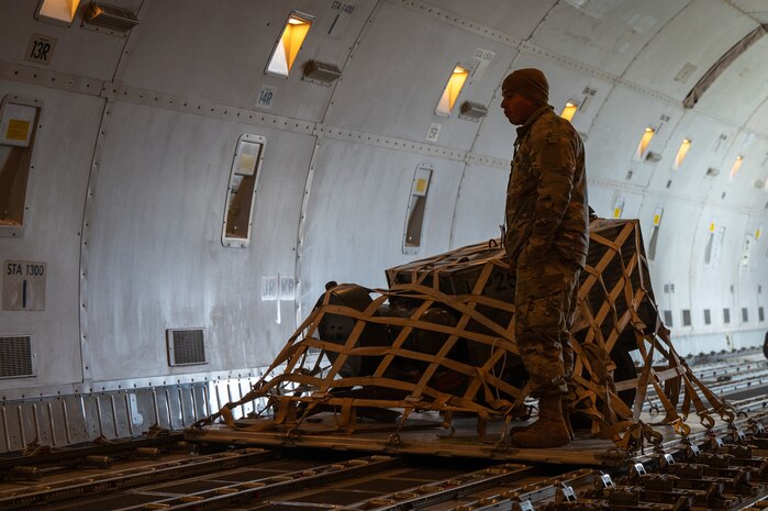 U.S. Air Force Tech. Sgt. Adrian Diaz, 35th Logistics Readiness Squadron (LRS) air transportation function non-commissioned officer in charge, supervises cargo loading in preparation of Balikatan 25 at Misawa Air Base, Japan, April 1, 2025. The 35th LRS delivers essential logistical support for agile operations in the Indo-Pacific theater. (U.S. Air Force photo by Kohei Sugisawa)
