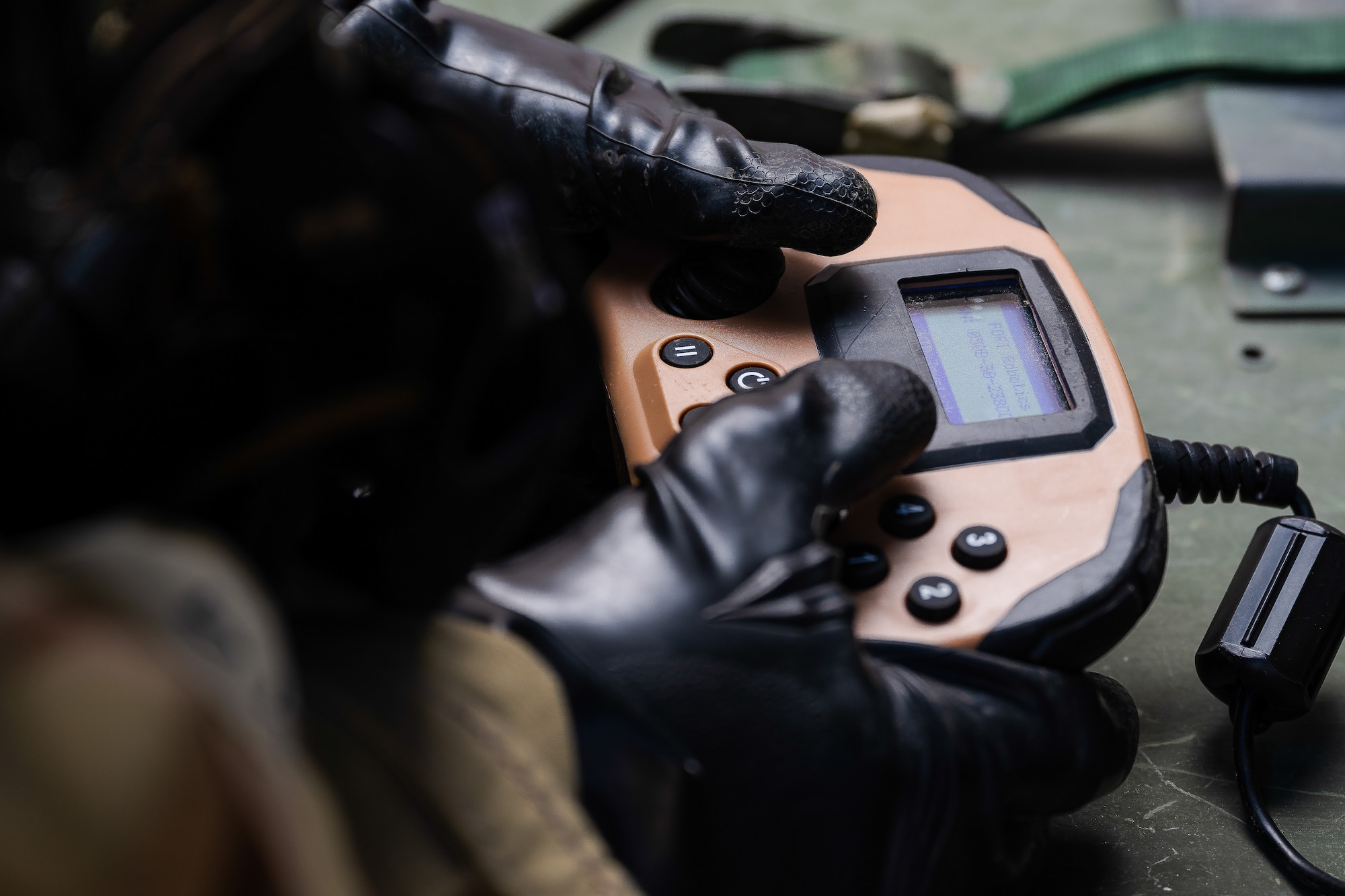 U.S. Air Force Senior Airman Jacob Stasser pilots a drone.