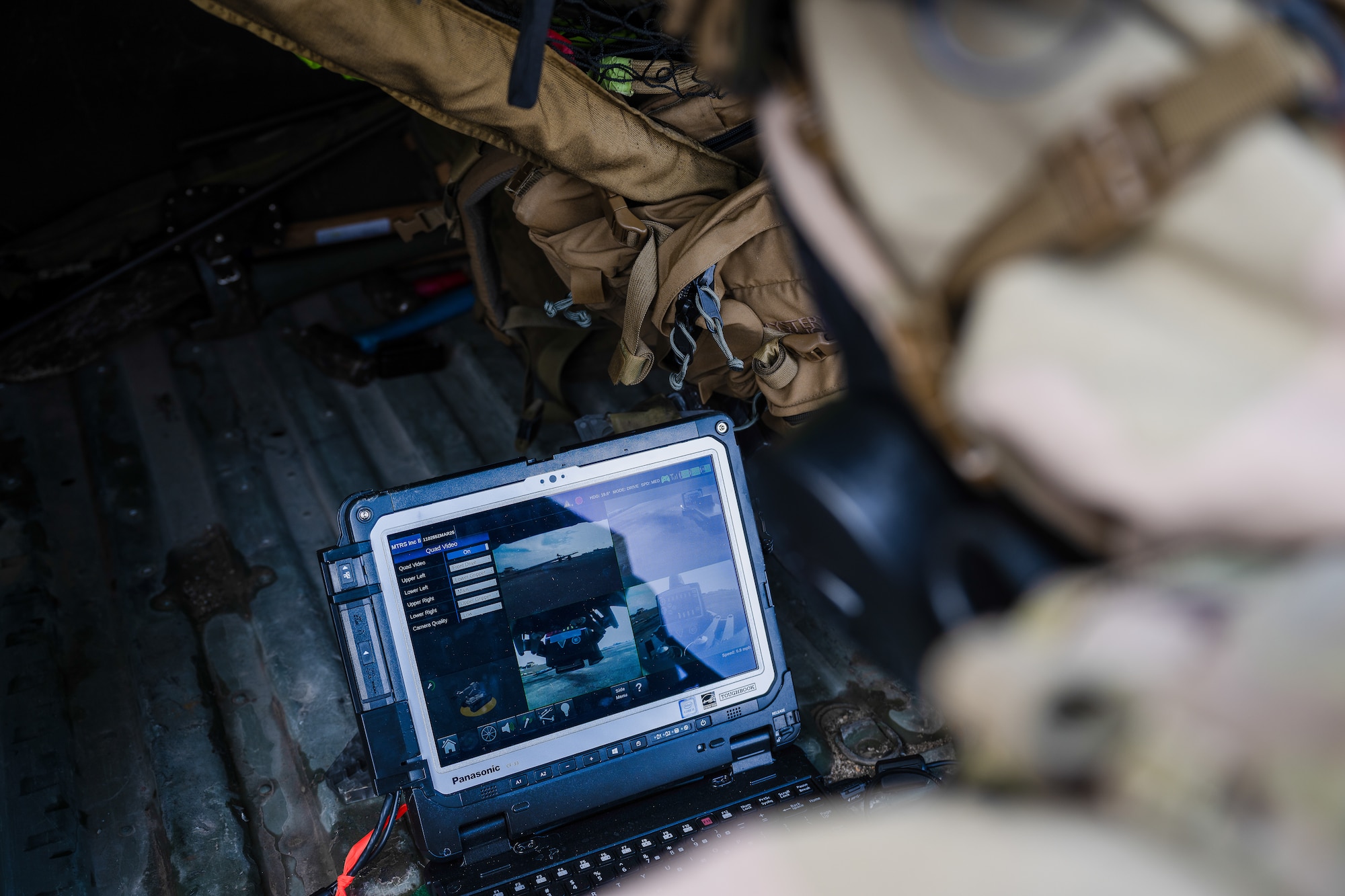 U.S. Air Force Senior Airman Jacob Stasser pilots a drone.