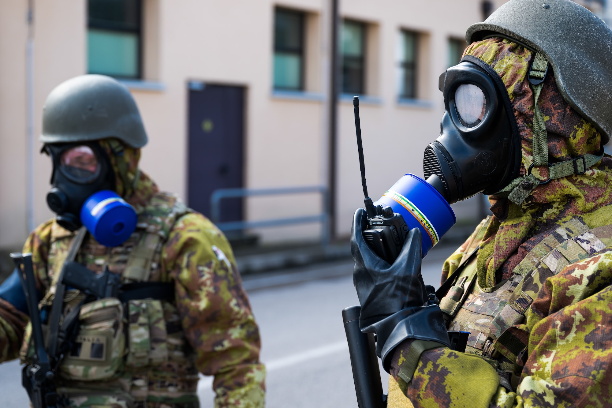 Italian Air Force Senior Airmen perform radio checks.