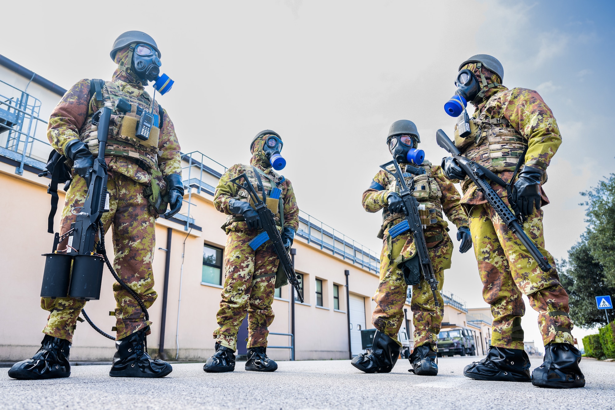 Italian Air Force Airmen provide security.