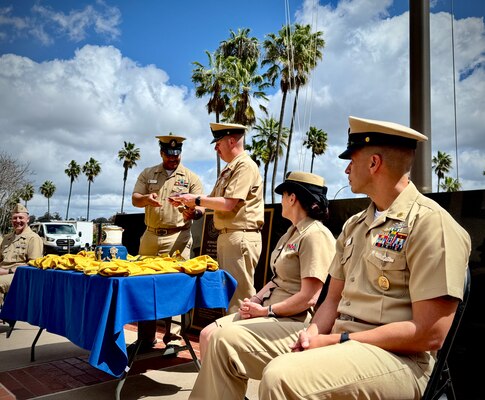 SAN DIEGO (April 1, 2025) – Naval Medical Center San Diego (NMCSD) Chief Petty Officers (CPOs) gather at Flag Circle to celebrate the 132nd Chief Petty Officer Birthday with a traditional cake-cutting ceremony, Apr. 1, 2025.  In the background, Master Chief Hospital Corpsman Lukas Gardner (R), NMCSD Director for Administration’s senior enlisted leader, and Chief Hospital Corpsman Nathaniel Garrett (L), NMCSD deputy reserve program director, cut the ceremonial cake as the respective oldest and youngest CPOs in attendance, symbolizing the continuity of leadership and mentorship within the Mess.  The mission of NMCSD is to provide a superior experience for our patients, staff, and warfighters. NMCSD employs more than 5,000 active-duty military personnel, civilians, and contractors in southern California to deliver exceptional care afloat and ashore.