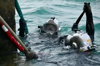 Engineering Aide 2nd Class Noah Lascola and Construction Mechanic 2nd Class Dylan Wagner, assigned to Underwater Construction Team 1 Construction Dive Detachment ALFA, deployed under 22nd Naval Construction regiment, conduct dive training ensuring maritime infrastructure and underwater systems readiness aboard Naval Station Rota, March 7, 2025. 22nd NCR commands naval construction forces for Navy Expeditionary Combat Forces Europe-Africa/Task Force 68 across the 6th Fleet area of Operations to defend U.S., allied, and partners interests.