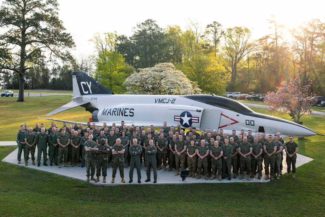 U.S. Marine Corps Maj. Gen. William H. Swan, center, from Wisconsin, commanding general, 2nd Marine Aircraft Wing, poses for a photo with senior leaders and staff from across 2nd MAW during the April 2025 Senior Leader Conference at Marine Corps Air Station Cherry Point, North Carolina, April 1, 2025.  The April 2025 SLC brought together 2nd MAW O-6 and O-5 commanders, station commanders, their senior enlisted leaders, and 2nd MAW staff to enhance their understanding of key topics impacting 2nd MAW and improve mission effectiveness at each level of command. (U.S. Marine Corps photo by Chief Warrant Officer 2 Akeel Austin)
