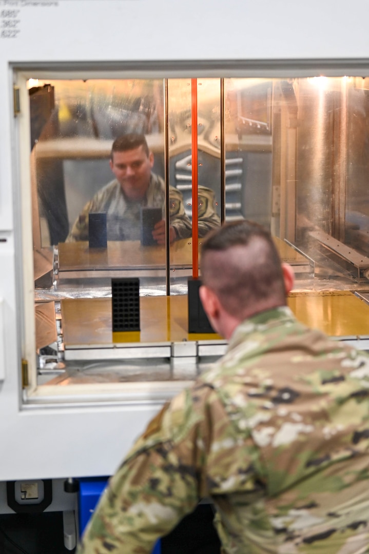 Staff Sgt. Ryan Krasnecky, 104th Fighter Wing metals technology journeyman, examines a 3D-printed ammo container, January 15, 2025, at Barnes Air National Guard Base, Westfield, Mass.