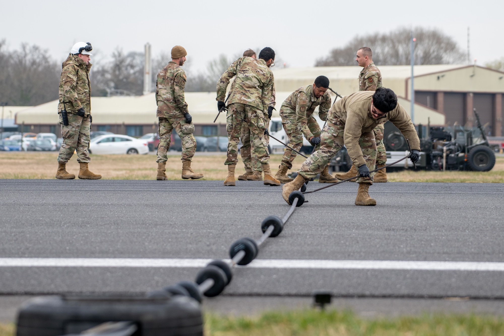 Airmen space donuts on a Mobile Aircraft Arresting System