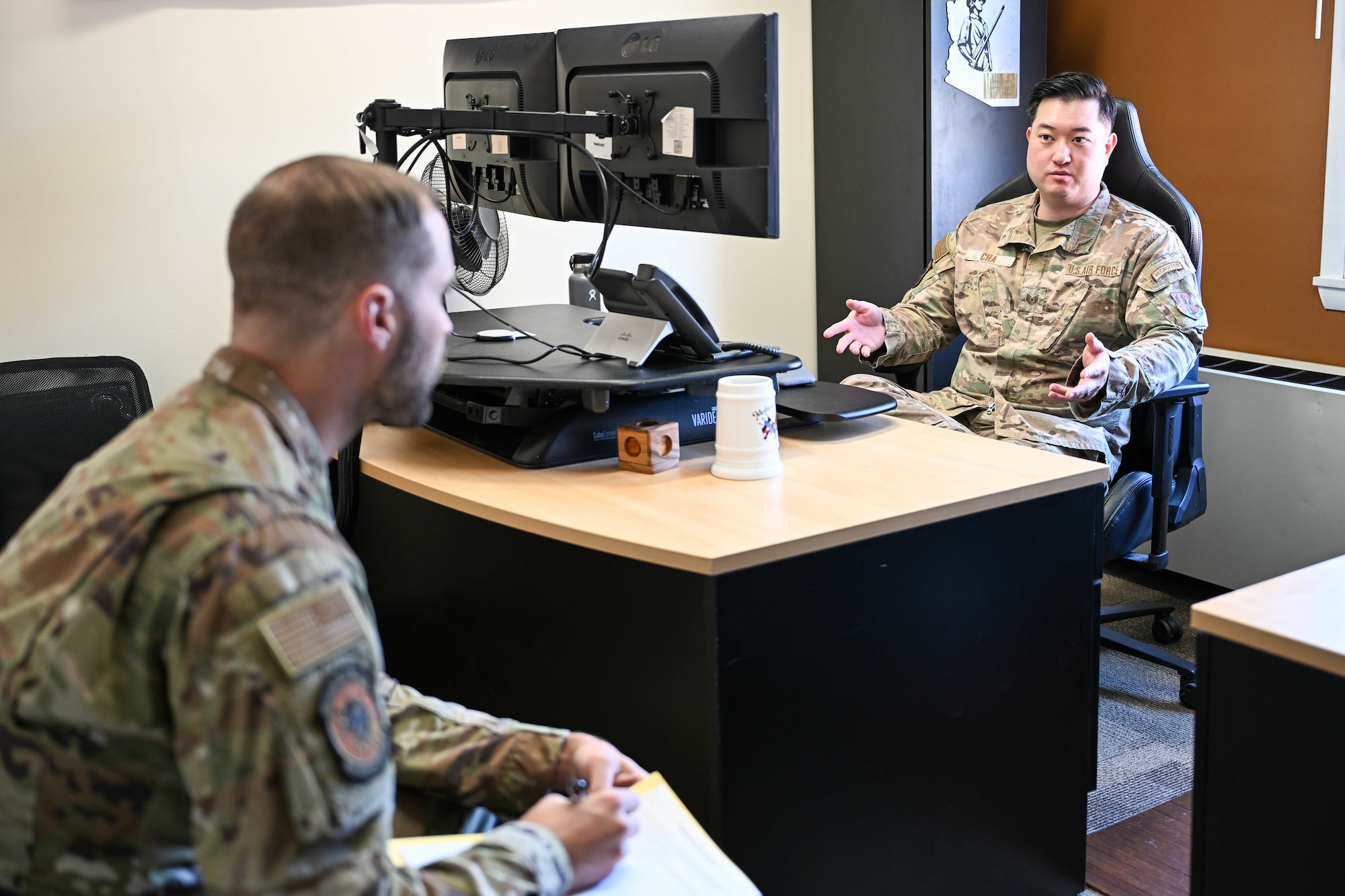 Technical Sgt. Jonathan Cha, in-service recruiter, speaks to an Airman inquiring about the U.S. Air National Guard March 26, 2025, at Hill Air Force Base, Utah. (U.S. Air Force photo by Cynthia Griggs)
