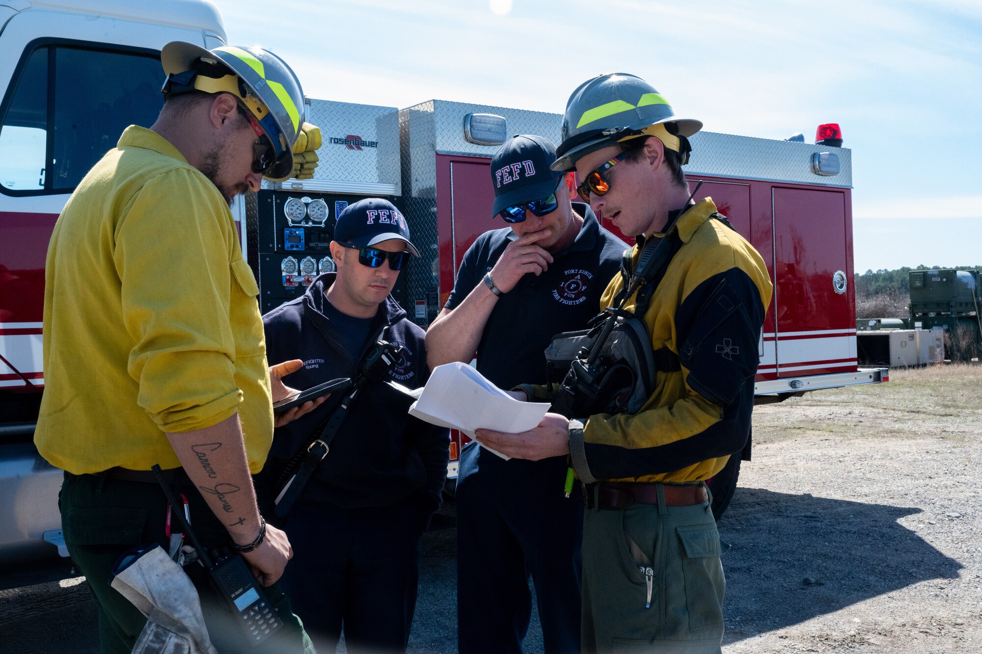 Wildlife and Ft. Eutis firefighters go over the plan