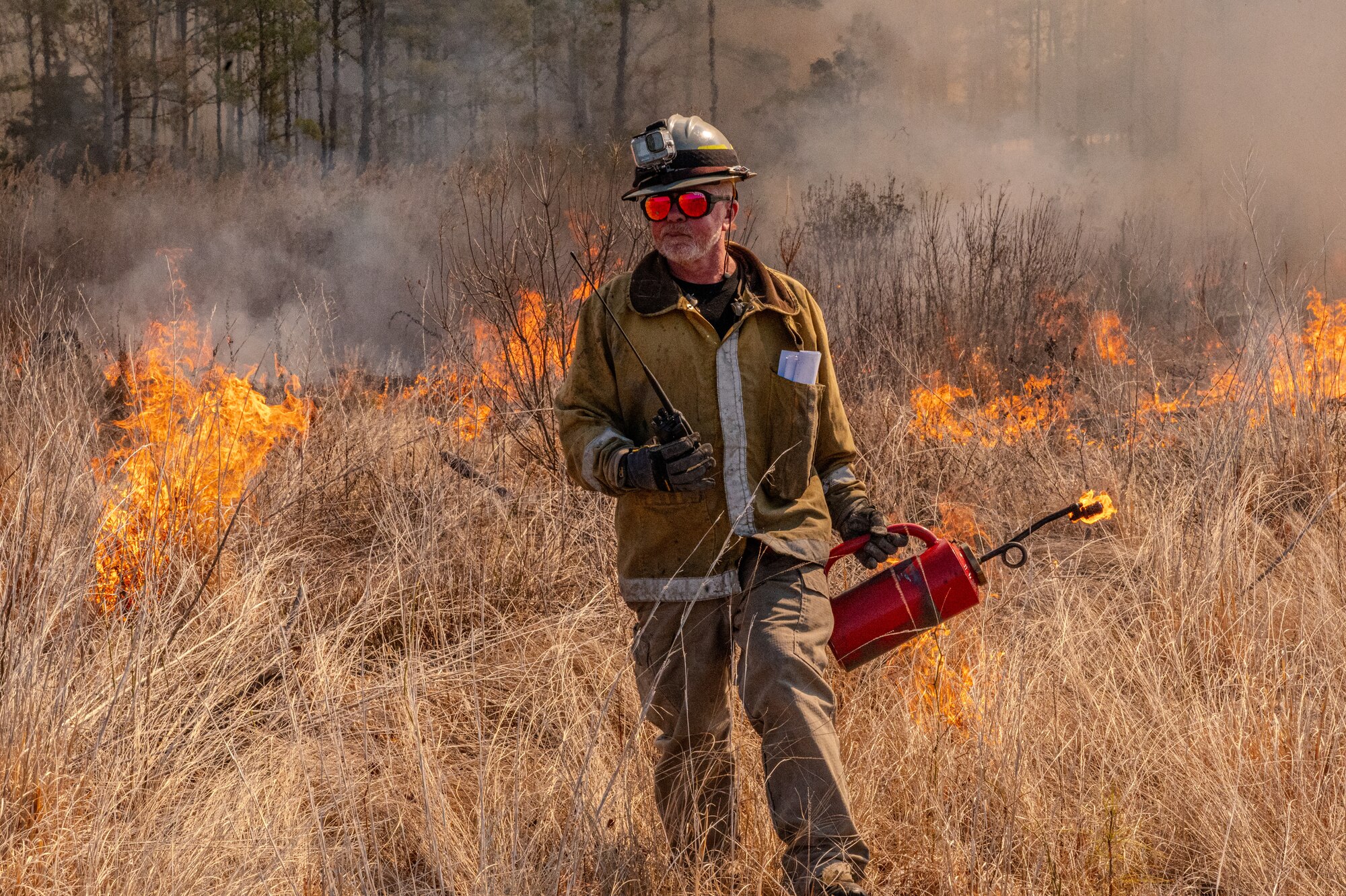 Firefighter uses his radio