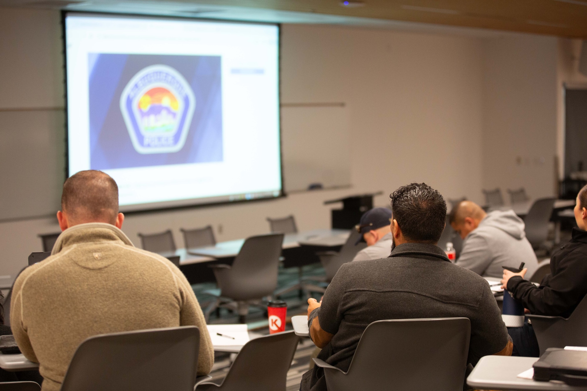 civilian people in a classroom setting